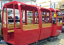Sit-in cable car props for corporate event